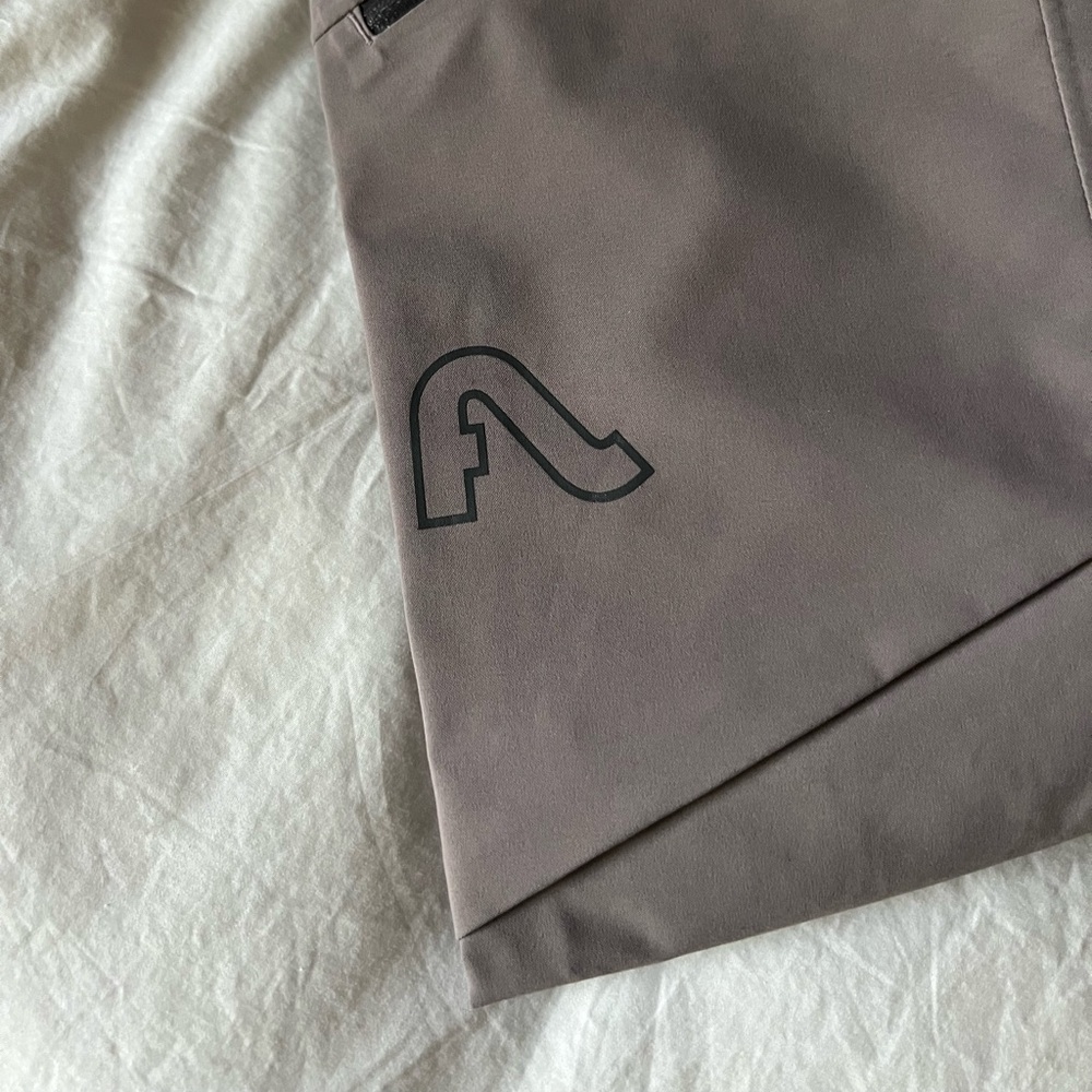NWOT - rare - Foxy Bib shark Large - Flylow - light purple/grey
